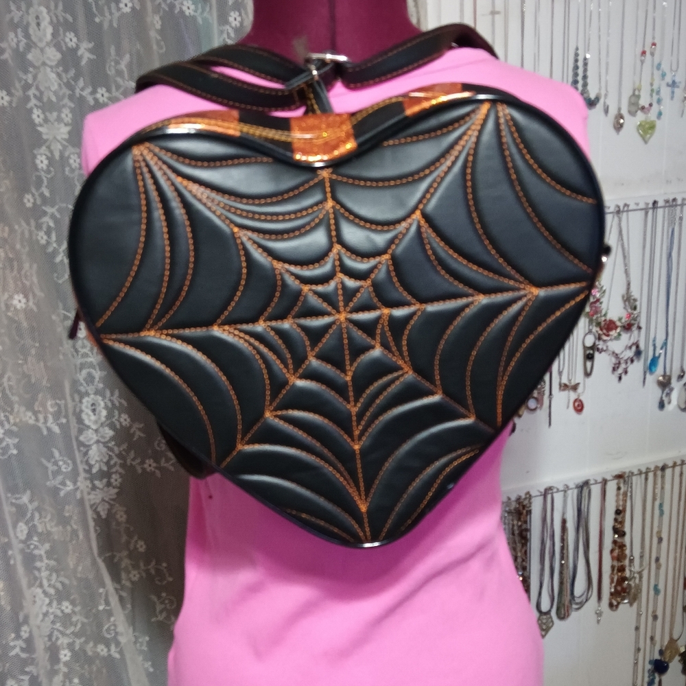 Love, Pain and Stitches Halloween heart pumpkin crossbody bag.